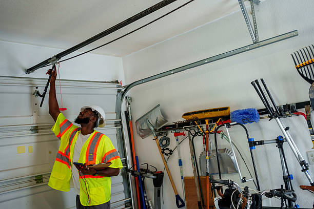 Professional Garage Door Panel Replacement technician working in Broken Bow, OK